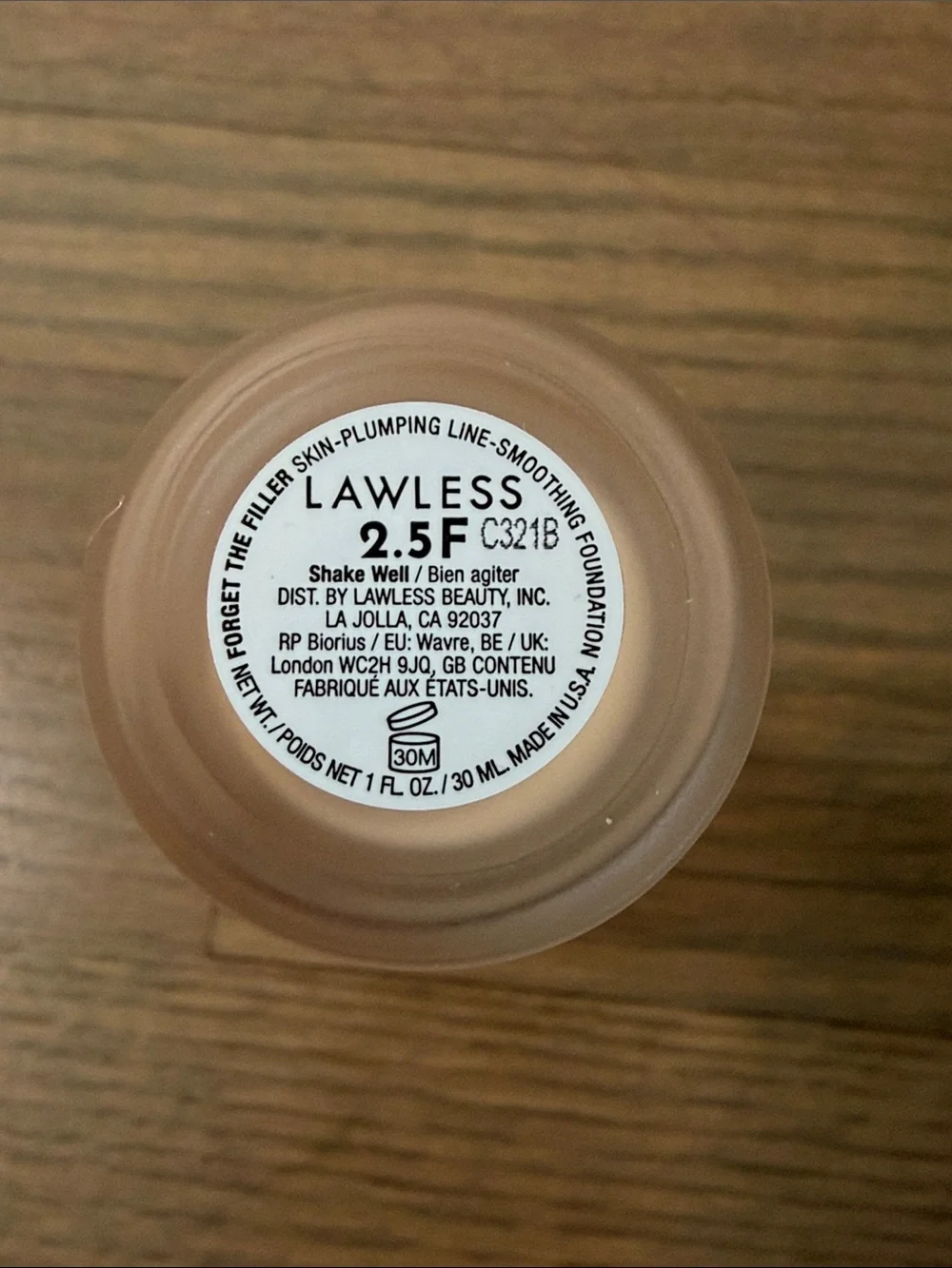 LAWLESS Foundation Bottle in Light Beige with Rose Gold Cap
